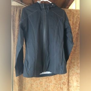 Woman’s Black KÜHL Jetstream rain coat size SMALL